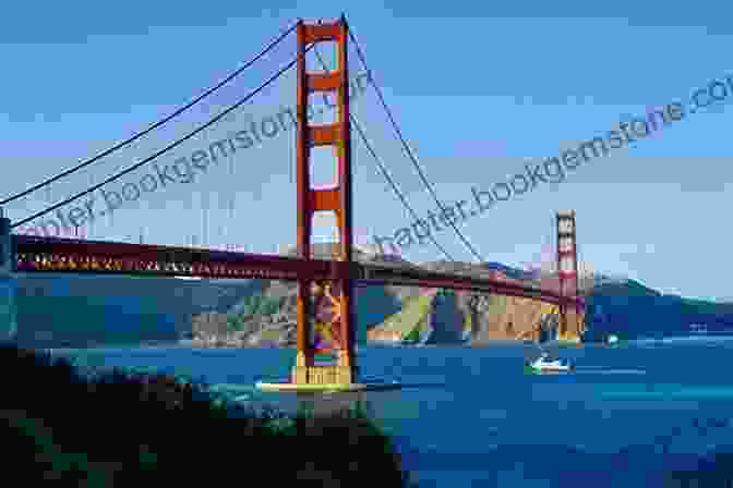 A Breathtaking View Of The Golden Gate Bridge On A Sunny Day, With Sailboats Gliding Along The Blue Waters Of San Francisco Bay. Our Day In The Sun