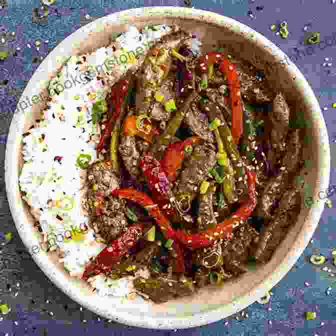 A Plate Of Sizzling Sichuan Beef, A Spicy And Aromatic Dish Featuring Tender Beef Slices And Vibrant Vegetables Best Wok Recipes From Mama Li S Kitchen: Healthy Quick And Easy One Pot Meals For Busy Families (Mama Li S Chinese Food Cookbooks)